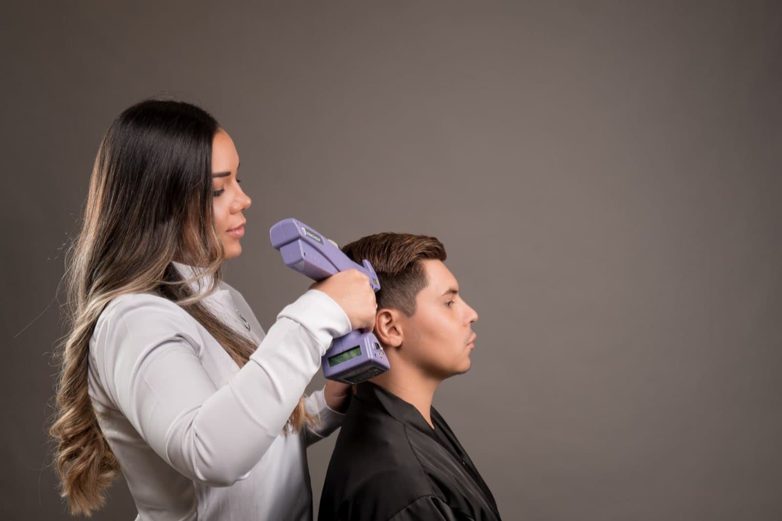 Specialist performing a hair treatment