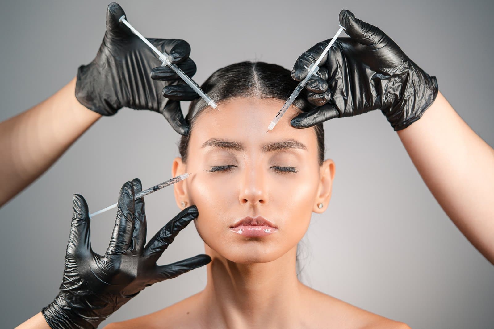 Several facial mesotherapy micro-injections